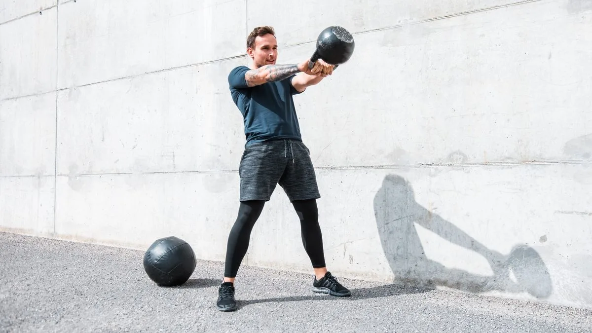 Yes, you can build upper-body strength without a gym — thanks to this instructor's 30-minute kettlebell workout