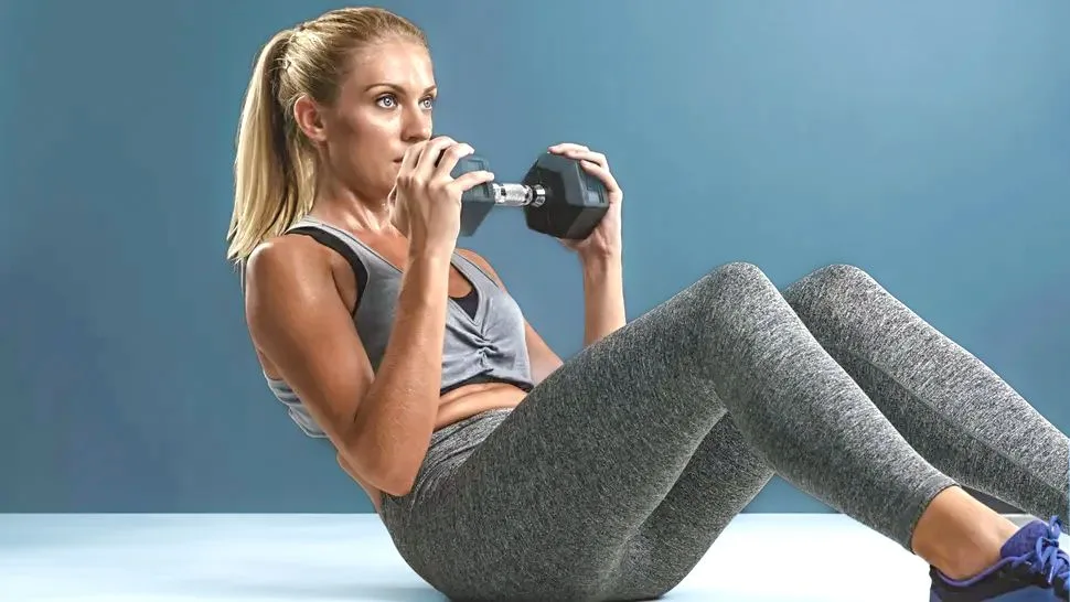 Skip the gym — all you need is 10 minutes and 2 dumbbells to strengthen your core