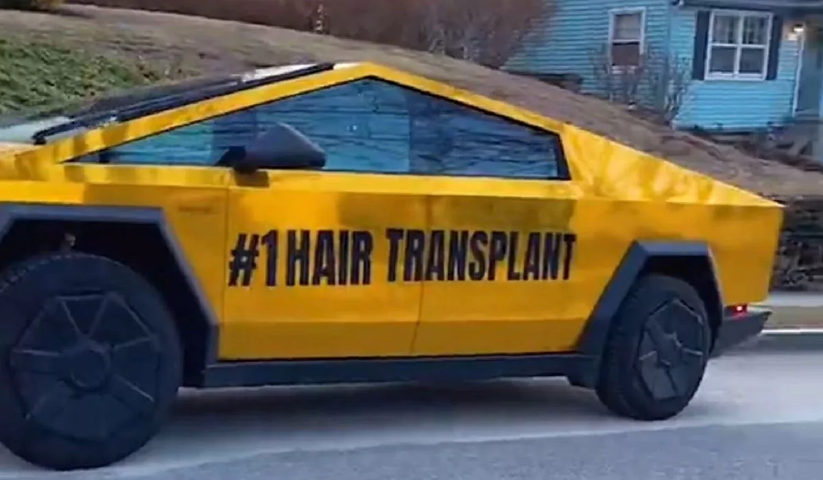 Man Removes Huge Letters Reading "#1 Hair Implants" From His Gold Cybertruck After Relentless Bullying